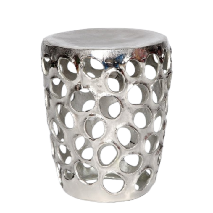 Polished silver accent stool with circular cutout design — modern metallic side table or decorative seating for events