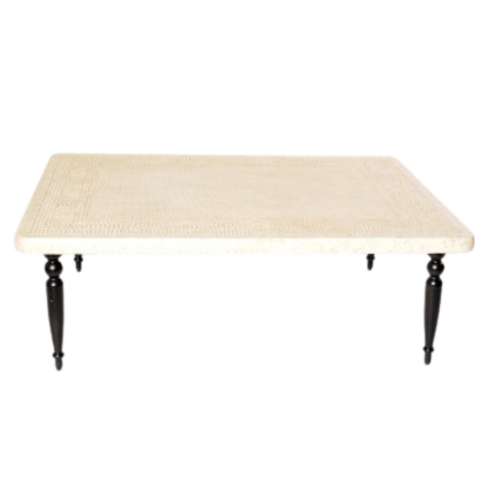 Rectangular cream mosaic stone coffee table with black turned legs, modern lounge table for weddings and events.