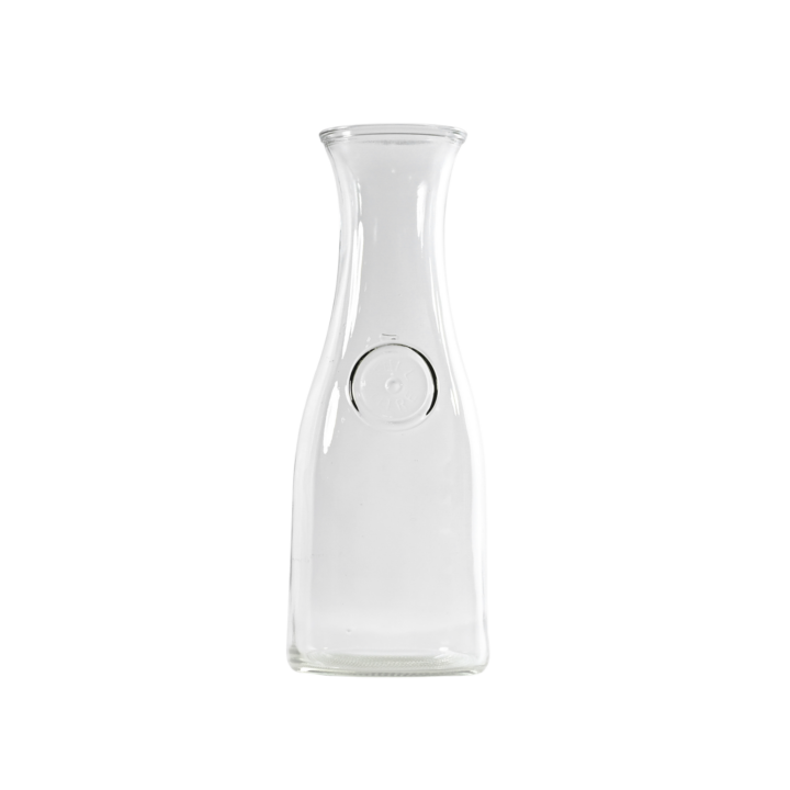 Clear glass all-purpose carafe with a 32-ounce capacity, featuring a classic curved silhouette and embossed circular detail. Perfect for serving water, juice, or wine at events or table settings.