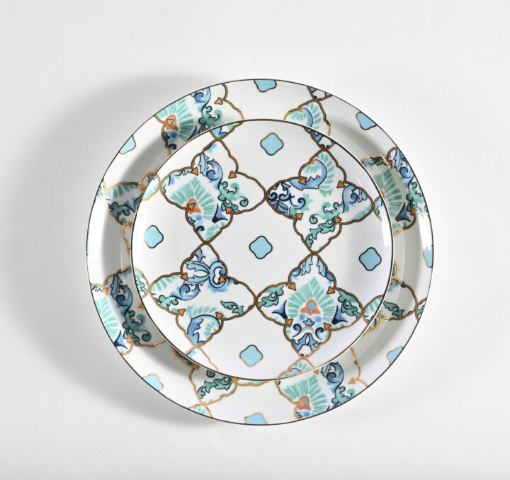 Amalfi China Collection featuring vibrant blue, teal, and gold lattice-inspired patterns on white porcelain. Includes Salad Plate (8") and Dinner Plate (10.5"). A bold and coastal-inspired design perfect for Mediterranean-themed events or elegant summer tablescapes.