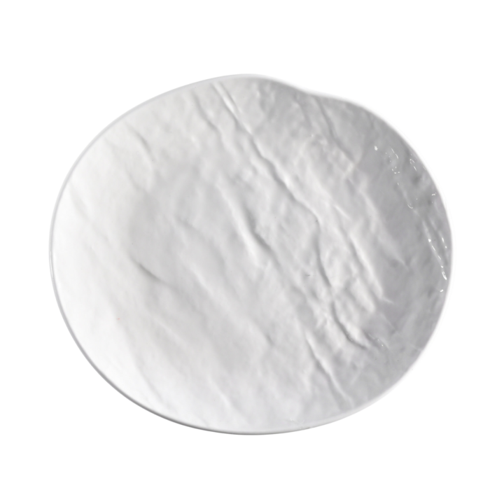 Ivory Juneau cocktail or dessert plate measuring 6.75 inches, featuring a hand-textured, organic design with a softly irregular shape for an artisanal and modern presentation.