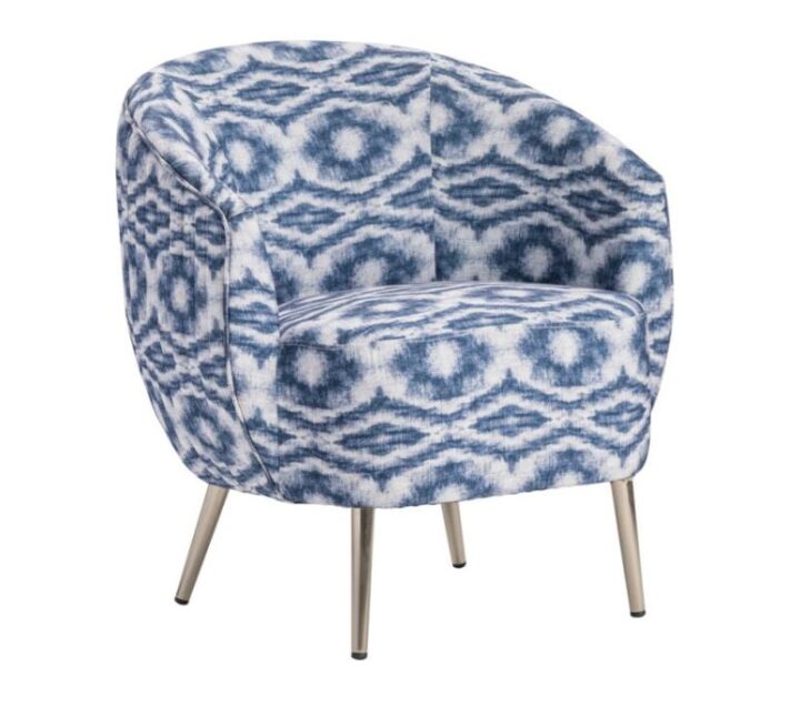 Charleston Accent Chair in blue and white featuring a rounded back and modern silhouette. Upholstered in an eye-catching ikat-inspired fabric with sleek metal legs, this chair adds a bold yet sophisticated touch to lounge areas or event seating.