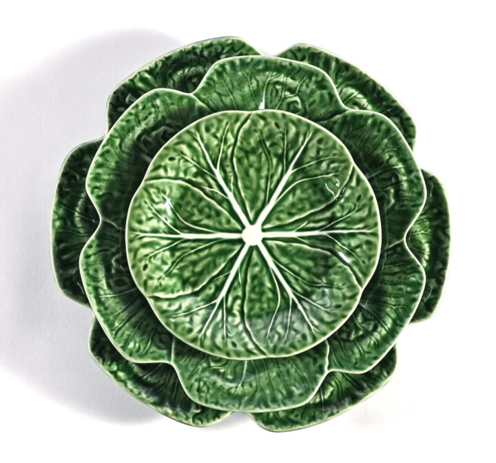 Green ceramic cabbage dinnerware set featuring a textured, leaf-shaped design. Includes Dinner Plate (10") and Salad / Dessert Plate (7.5"). Perfect for garden parties, spring events, or vibrant tablescapes.