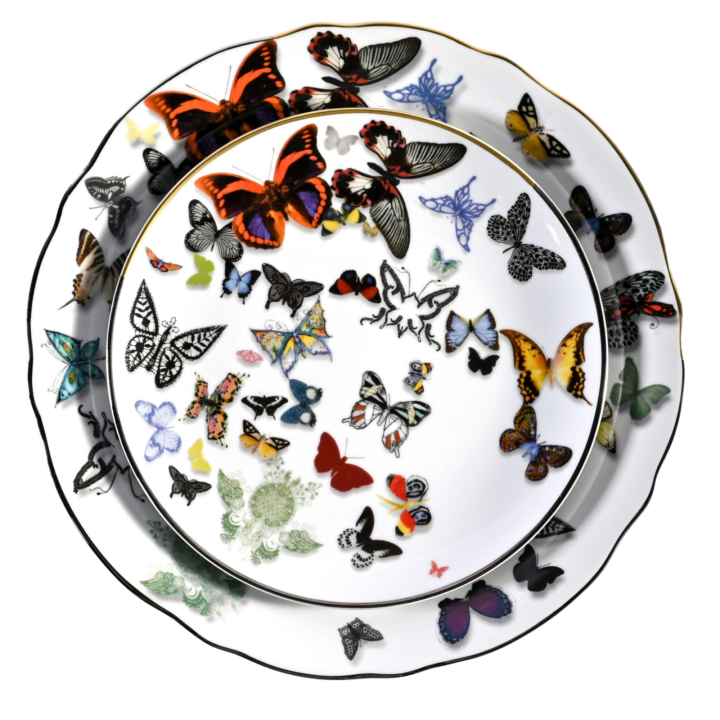Butterfly Parade china dinner and salad plates featuring vibrant multicolored butterfly illustrations on white porcelain with a delicate black rim.