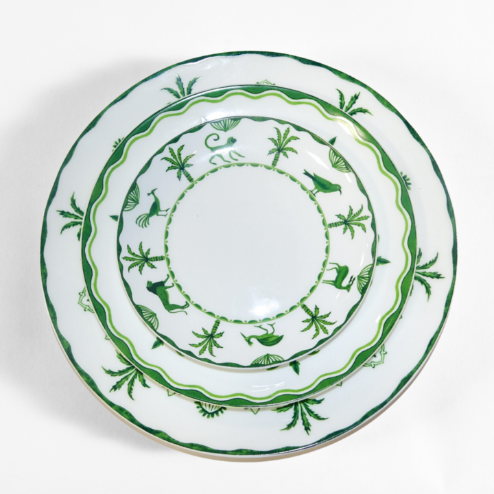 Sultan’s Garden Dinnerware Collection — elegant white porcelain plates with intricate green botanical and palm tree motifs inspired by tropical gardens. Available in Bread Plate (6"), Salad / Dessert Plate (8.25"), and Dinner Plate (10.5"). Perfect for sophisticated and nature-inspired table settings.