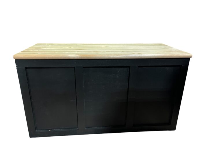 Le Mans Entry Table in black featuring a sleek rectangular base with a contrasting natural wood top. A modern and versatile table design ideal for event entry displays, check-in stations, or buffet setups.