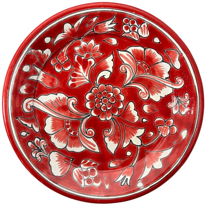 Talavera Red Salad Plate, 9" — handcrafted ceramic plate featuring a bold red glaze with intricate white floral motifs in traditional Talavera style. Perfect for adding vibrant, artisanal charm to tabletop settings and festive events.