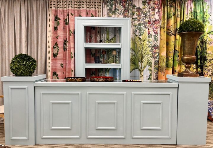 Allegro Blue Bar Collection featuring a coordinated set of powder blue paneled event bars and shelving, including straight and curved bar options, matching pedestals, and a tall bar-back shelving unit. Elegant and timeless design ideal for beverage service or event display styling.