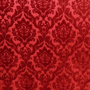 Luxurious Neiman Red Chenille fabric with a rich damask pattern in deep crimson tones, available in 132-inch width for elegant drapery, upholstery, or event décor.