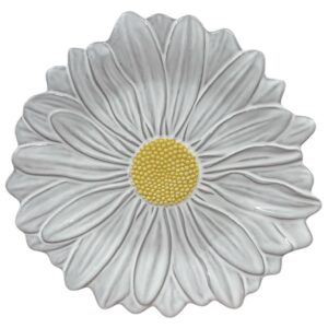White ceramic daisy plate with detailed petals and a yellow textured center, decorative floral dish for serving or table styling.