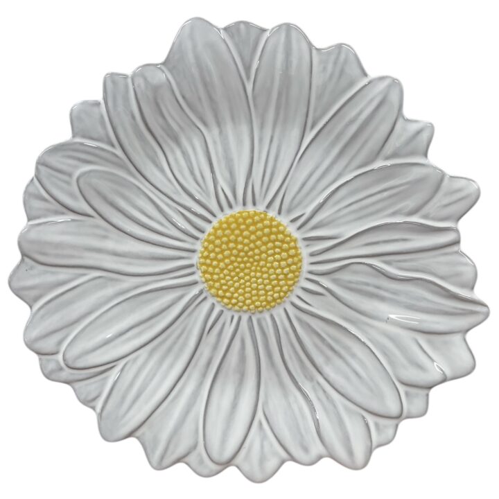 White ceramic daisy plate with detailed petals and a yellow textured center, decorative floral dish for serving or table styling.