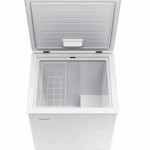 Open compact refrigerator in white, showing a wire storage basket and spacious interior compartment.