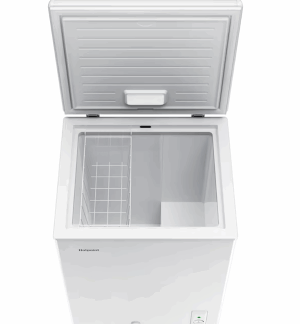 Open compact refrigerator in white, showing a wire storage basket and spacious interior compartment.