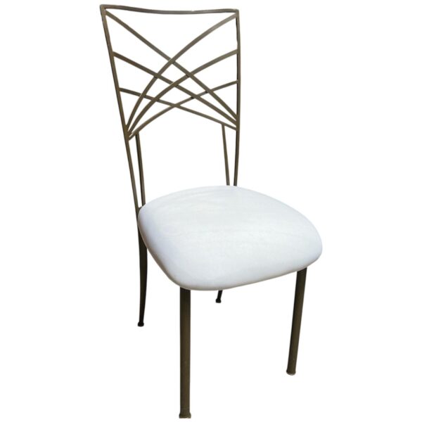 Chameleon Chair in antique gold finish featuring an elegant crisscross metal back design and slender legs. Paired with a removable ivory cushion, this versatile chair adds a sophisticated touch to weddings, galas, and upscale events.