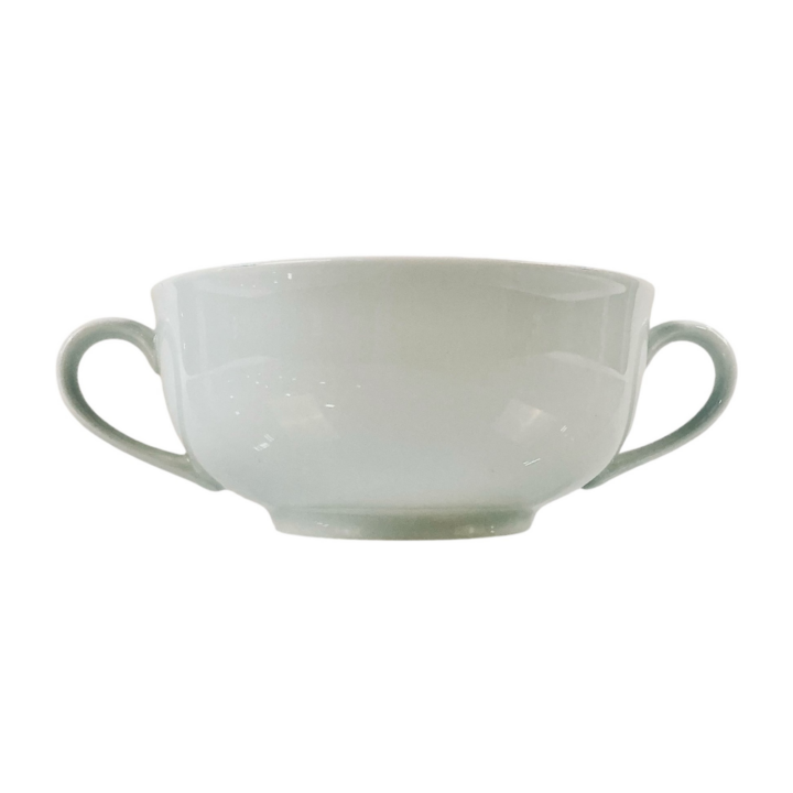 White porcelain bouillon bowl with dual side handles, ideal for serving soups, broths, or appetizers. Available in 4 oz. and 8 oz. sizes for versatile event and dining presentations.