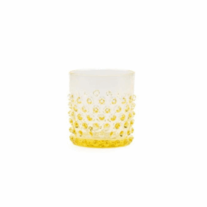 Short citron yellow hobnail vase with a compact form and raised textured dot pattern. Holds 9 oz and is ideal for petite floral arrangements or accent styling.