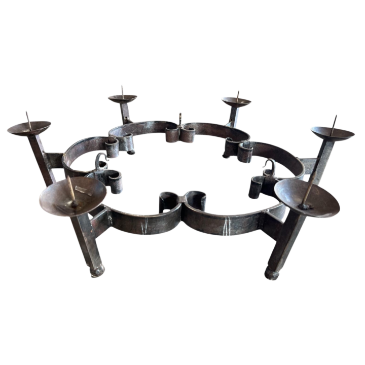 Iron Candelabra in Antique Iron — 30" diameter x 7.25" height round metal candle holder with rustic iron finish and spiked holders, ideal for taper candles and statement centerpieces.