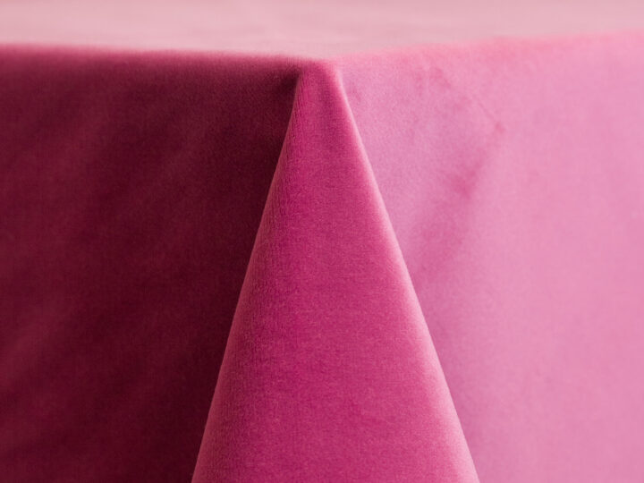 Hot pink velvet draping panel with plush texture, 12-foot height and 6-foot width, ideal for event backdrops and statement installations.