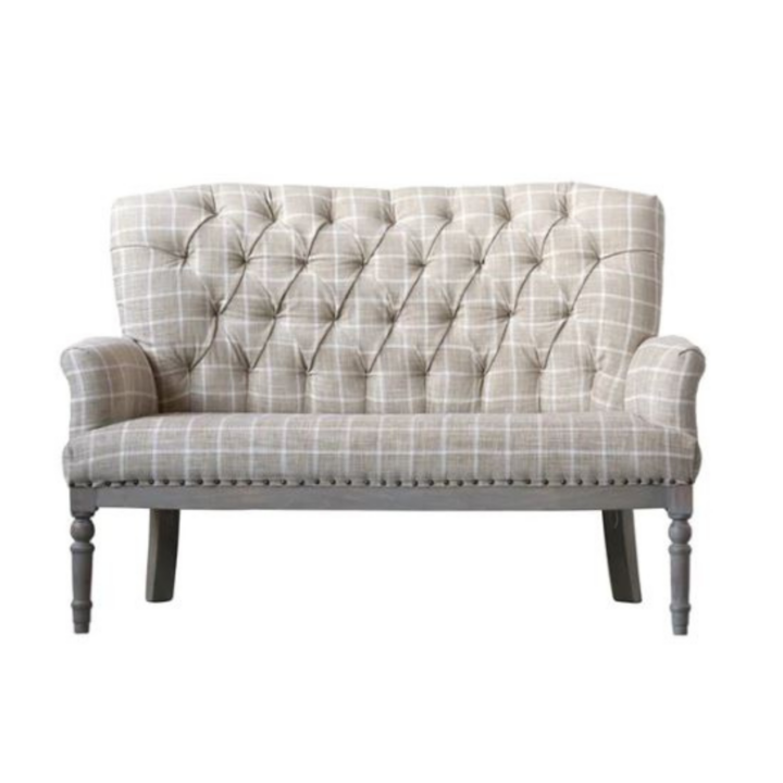 Taupe and white plaid settee sofa with button-tufted back, rolled arms, nailhead trim, and turned wood legs.