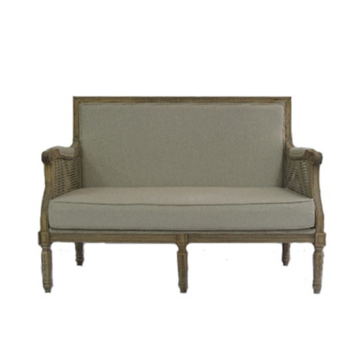 Provence loveseat with cane side panels, natural wood frame, and linen cushions, French provincial lounge seating for weddings and events